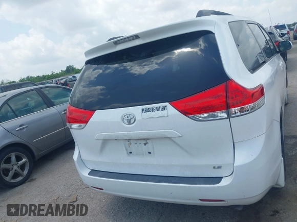 2014 Toyota Sienna LE AAS with VIN 5TDKK3DC0ES525654, listed as a IAAI auction lot 42153582 with 71,258 mi miles and . Bid and sale history available at carsss.com. Image 16.