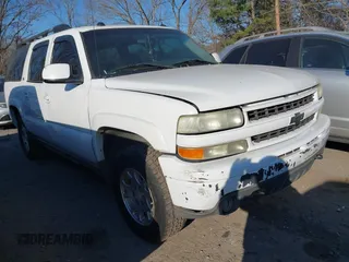 2004 Chevrolet Suburban Z71 with VIN 3GNFK16T84G297488, listed as a IAAI auction lot 41671436 with 1 mi miles. Bid and sale history available at carsss.com. Image 1.