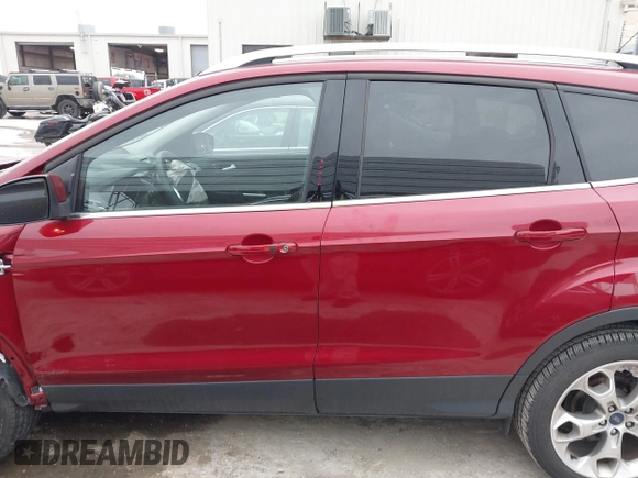 2015 Ford Escape Titanium with VIN 1FMCU0J98FUC07196, listed as a IAAI auction lot 41930660 with 51,161 mi miles and . Bid and sale history available at DreamBid. Image 14.
