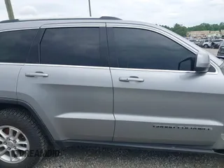 2018 Jeep Grand Cherokee Laredo E with VIN 1C4RJFAG4JC475993, listed as a IAAI auction lot 42295008 with 106,024 mi miles and . Bid and sale history available at DreamBid. Image 14.