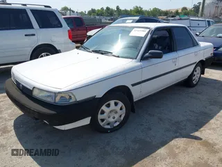 1990 Toyota Camry z VIN JT2SV21E9L0352085, wystawiony jako IAAI lot #42419588 z przebiegiem 138 425 mil mil oraz . Historia ofert i sprzedaży dostępna na DreamBid. Obrazek 2.