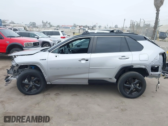 2021 Toyota RAV4 Hybrid XSE z VIN 4T3E6RFV9MU027713, wystawiony jako IAAI lot #42587759 z przebiegiem 28 806 mil mil oraz . Historia ofert i sprzedaży dostępna na DreamBid. Obrazek 15.