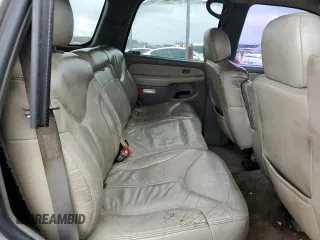 2001 GMC Yukon SLT z VIN 1GKEC13T51J145673, wystawiony jako Copart lot #83568954 z przebiegiem 310 415 mil mil oraz Szkoda całkowita • Salvage title. Historia ofert i sprzedaży dostępna na DreamBid. Obrazek 11.