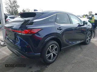 2025 Lexus RX with VIN JTJCHMAA2S2022218, listed as a IAAI auction lot 41397962 with 1,185 mi miles. Bid and sale history available at carsss.com. Image 4.
