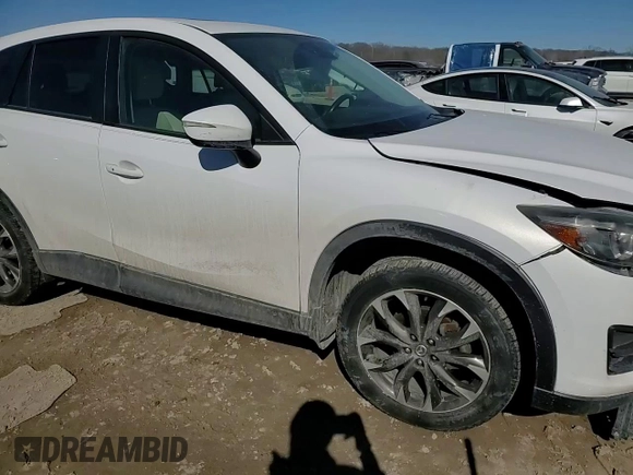 2016 Mazda CX-5 Grand Touring with VIN JM3KE4DYXG0781063, listed as a Copart auction lot 47099825 with 0 mi miles and Salvage Title. Bid and sale history available at carsss.com. Image 10.