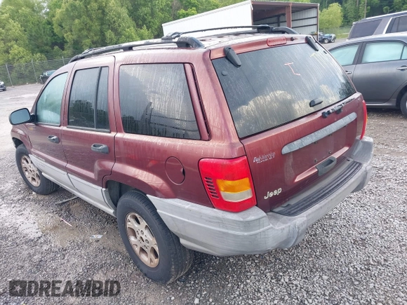 2000 Jeep Grand Cherokee Laredo with VIN 1J4G248S0YC351033, listed as a IAAI auction lot 42165830 with 145,351 mi miles and . Bid and sale history available at DreamBid. Image 3.