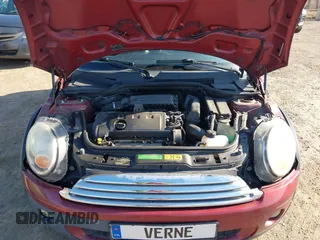 2009 MINI Cooper Hardtop with VIN WMWMF33509TU71339, listed as a IAAI auction lot 41777908 with 155,698 mi miles. Bid and sale history available at carsss.com. Image 10.