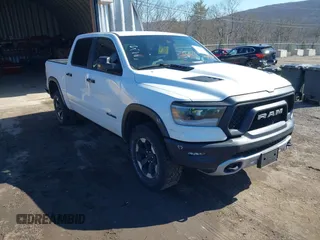 2023 Ram 1500 Rebel with VIN 1C6SRFLT4PN583362, listed as a IAAI auction lot 41453622 with 18,699 mi miles and . Bid and sale history available at DreamBid. Image 1.