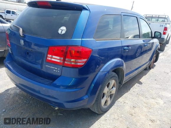 2009 Dodge Journey SXT with VIN 3D4GG57V89T551949, listed as a IAAI auction lot 41874310 with 170,084 mi miles. Bid and sale history available at carsss.com. Image 4.