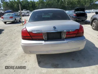 2003 Mercury Grand Marquis LS Premium with VIN 2MEHM75W63X697725, listed as a Copart auction lot 54485505 with 129,194 mi miles and Salvage Title. Bid and sale history available at DreamBid. Image 6.