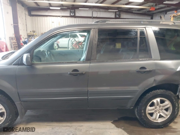 2005 Honda Pilot EX-L with RES with VIN 2HKYF18655H521175, listed as a IAAI auction lot 41490812 with 357,033 mi miles. Bid and sale history available at carsss.com. Image 15.