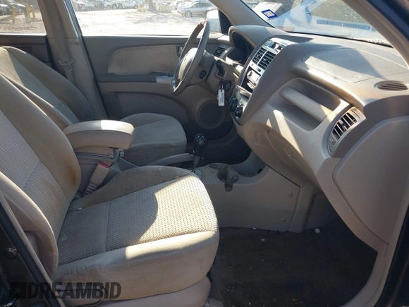 2005 Kia Sportage LX z VIN KNDJF723757132772, wystawiony jako IAAI lot #41436925 z przebiegiem 134 653 mil mil oraz . Historia ofert i sprzedaży dostępna na DreamBid. Obrazek 5.