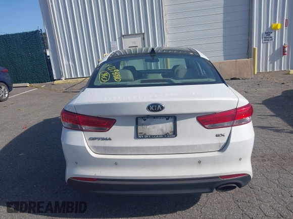 2016 Kia Optima EX with VIN 5XXGU4L32GG070138, listed as a IAAI auction lot 42138810 with 131,040 mi miles. Bid and sale history available at carsss.com. Image 16.