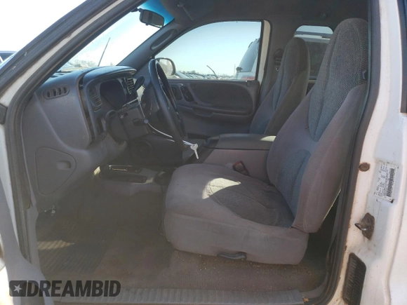 1999 Dodge Dakota SLT with VIN 1B7GG22Y6XS119274, listed as a Copart auction lot 46947005 with 264,537 mi miles and Salvage Title. Bid and sale history available at DreamBid. Image 7.