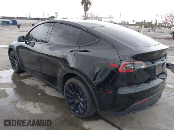 2022 Tesla Model Y Long Range z VIN 7SAYGDEE0NF508958, wystawiony jako IAAI lot #42191819 z przebiegiem 60 880 mil mil oraz . Historia ofert i sprzedaży dostępna na DreamBid. Obrazek 3.