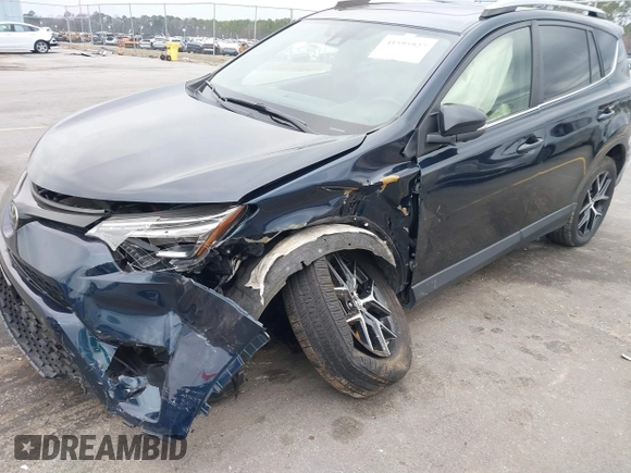 2017 Toyota RAV4 SE with VIN JTMJFREV0HD200683, listed as a IAAI auction lot 41595927 with 109,981 mi miles and . Bid and sale history available at DreamBid. Image 6.
