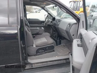 2004 Ford F-150 STX with VIN 1FTRX14W84NB75113, listed as a IAAI auction lot 41839952 with 75,001 mi miles and . Bid and sale history available at DreamBid. Image 5.