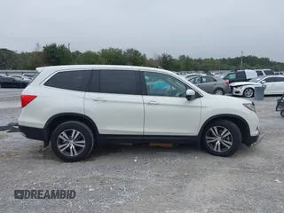 2017 Honda Pilot EX-L with VIN 5FNYF5H54HB009568, listed as a IAAI auction lot 41195225 with 112,763 mi miles. Bid and sale history available at carsss.com. Image 13.