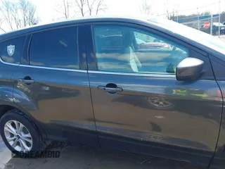 2019 Ford Escape SE z VIN 1FMCU9GD7KUA00132, wystawiony jako IAAI lot #41973998 z przebiegiem 89 327 mil mil oraz . Historia ofert i sprzedaży dostępna na DreamBid. Obrazek 13.