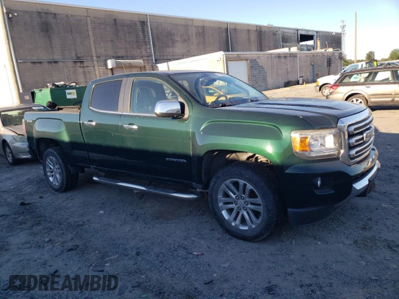2015 GMC Canyon 4WD SLT with VIN 1GTG6CE35F1246241, listed as a Copart auction lot 74748254 with 126,389 mi miles and Salvage Title. Bid and sale history available at carsss.com. Image 4.