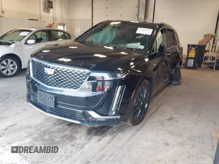 2022 Cadillac XT6 Premium Luxury z VIN 1GYKPDRS0NZ131233, wystawiony jako IAAI lot #41600244 z przebiegiem 112 258 mil mil oraz . Historia ofert i sprzedaży dostępna na DreamBid. Obrazek 2.