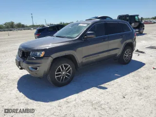 2018 Jeep Grand Cherokee Laredo E with VIN 1C4RJFAG9JC444089, listed as a Copart auction lot 49710925 with 127,707 mi miles and Salvage Title. Bid and sale history available at carsss.com. Image 1.