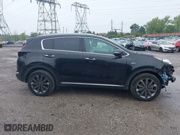 2018 Kia Sportage EX z VIN KNDPNCAC0J7441968, wystawiony jako IAAI lot #42269037 z przebiegiem 113 273 mil mil oraz . Historia ofert i sprzedaży dostępna na DreamBid. Obrazek 14.