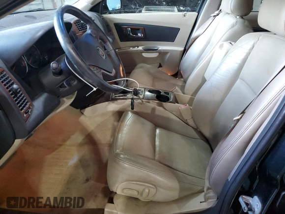 2005 Cadillac CTS with VIN 1G6DP567X50136502, listed as a Copart auction lot 74001284 with 133,361 mi miles and Salvage Title. Bid and sale history available at carsss.com. Image 7.