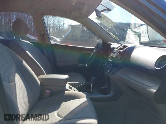 2006 Toyota RAV4 with VIN JTMBD33V766021794, listed as a IAAI auction lot 41817927 with 164,112 mi miles. Bid and sale history available at carsss.com. Image 5.