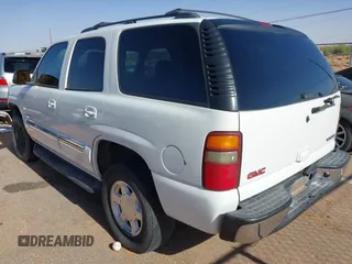 2005 GMC Yukon SLT z VIN 1GKEC13TX5R276234, wystawiony jako IAAI lot #42127846 z przebiegiem 210 802 mil mil oraz . Historia ofert i sprzedaży dostępna na DreamBid. Obrazek 3.