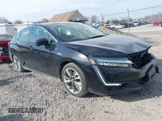 2018 Honda Clarity Plug-In Hybrid with VIN JHMZC5F12JC017148, listed as a IAAI auction lot 41829504 with 98,382 mi miles. Bid and sale history available at carsss.com. Image 1.