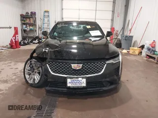2021 Cadillac CT4 Premium Luxury z VIN 1G6DF5RK6M0133758, wystawiony jako IAAI lot #40832245 z przebiegiem 13 543 mil mil oraz . Historia ofert i sprzedaży dostępna na DreamBid. Obrazek 13.