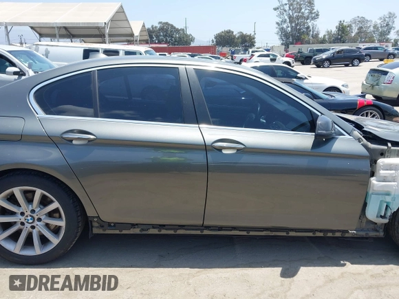 2014 BMW 5 Series 535i xDrive with VIN WBA5B3C57ED531072, listed as a IAAI auction lot 42574991 with 104,304 mi miles and . Bid and sale history available at DreamBid. Image 14.