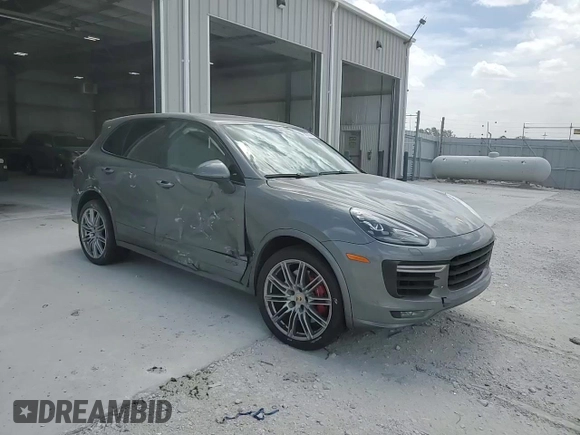 2016 Porsche Cayenne GTS с VIN WP1AD2A2XGLA80001, выставлен на аукционе Copart как лот 56706455 с пробегом 71 816 миль миль и Списание • Salvage title. История ставок и продаж доступна на DreamBid. Изображение 14.