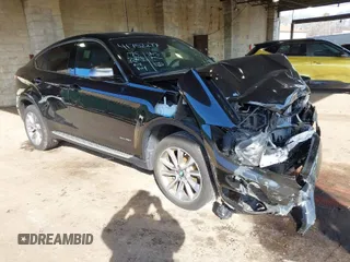 2018 BMW X6 xDrive35i with VIN 5UXKU2C53J0X51044, listed as a IAAI auction lot 41752299 with 75,259 mi miles. Bid and sale history available at carsss.com. Image 1.