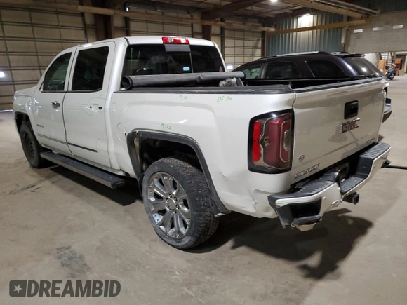 2017 GMC Sierra 1500 Denali with VIN 3GTU2PEJ2HG331787, listed as a Copart auction lot 82601664 with 112,008 mi miles and Salvage Title. Bid and sale history available at DreamBid. Image 2.