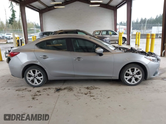 2014 Mazda 3 i Touring with VIN JM1BM1V78E1149363, listed as a IAAI auction lot 41968555 with 100,949 mi miles and . Bid and sale history available at DreamBid. Image 14.