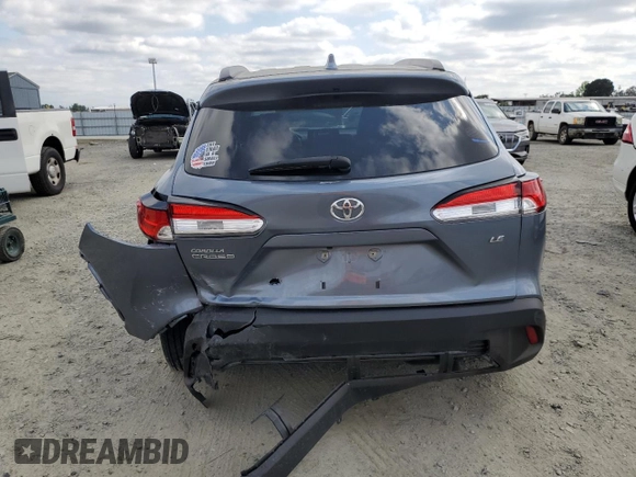 2023 Toyota Corolla Cross LE z VIN 7MUBAAAG6PV039602, wystawiony jako Copart lot #53419475 z przebiegiem 34 033 mil mil oraz Szkoda całkowita • Salvage title. Historia ofert i sprzedaży dostępna na DreamBid. Obrazek 6.