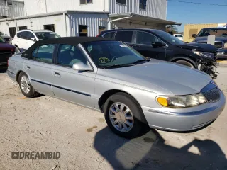 2001 Lincoln Continental with VIN 1LNHM97V31Y641106, listed as a Copart auction lot 77468194 with 86,363 mi miles and Clean Title. Bid and sale history available at carsss.com. Image 4.