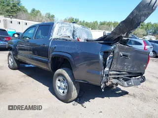 2023 Toyota Tacoma SR with VIN 3TMCZ5AN0PM614127, listed as a IAAI auction lot 41974924 with 12,674 mi miles and . Bid and sale history available at DreamBid. Image 3.