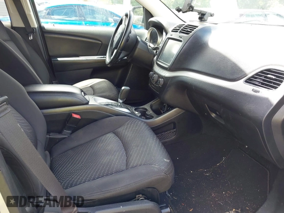 2014 Dodge Journey SXT with VIN 3C4PDCBB0ET281861, listed as a IAAI auction lot 42187485 with 124,191 mi miles and . Bid and sale history available at DreamBid. Image 5.