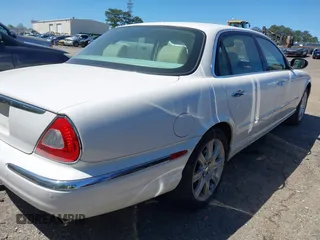 2005 Jaguar XJ 8 LWB with VIN SAJWA79C25SG48887, listed as a IAAI auction lot 42058896 with 177,315 mi miles and . Bid and sale history available at DreamBid. Image 4.