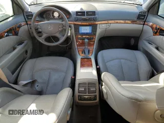2007 Mercedes-Benz E 550 with VIN WDBUF90X77X212587, listed as a Copart auction lot 79753664 with 111,768 mi miles and Salvage Title. Bid and sale history available at carsss.com. Image 8.