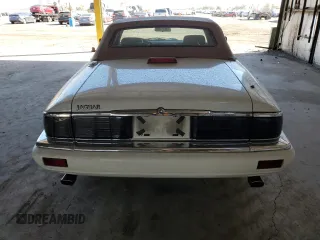 1994 Jaguar XJS with VIN SAJNX2743RC191142, listed as a Copart auction lot 78262994 with 70,111 mi miles and Salvage Title. Bid and sale history available at carsss.com. Image 6.