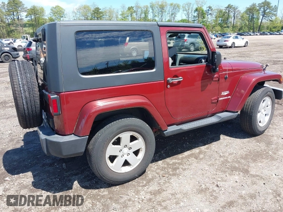2010 Jeep Wrangler Sahara z VIN 1J4GA5D16AL227053, wystawiony jako IAAI lot #42219421 z przebiegiem 67 174 mil mil oraz . Historia ofert i sprzedaży dostępna na DreamBid. Obrazek 4.