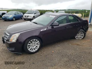 2010 Cadillac CTS Luxury z VIN 1G6DE5EG5A0140104, wystawiony jako Copart lot #57989785 z przebiegiem 129 914 mil mil oraz Szkoda całkowita • Salvage title. Historia ofert i sprzedaży dostępna na DreamBid. Obrazek 1.