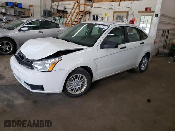 2009 Ford Focus SE with VIN 1FAHP35N19W146251, listed as a Copart auction lot 68979994 with 58,315 mi miles and Salvage Title. Bid and sale history available at carsss.com. Image 1.