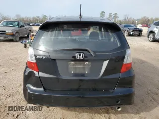 2010 Honda Fit Sport with VIN JHMGE8H44AS021590, listed as a Copart auction lot 52333635 with 137,770 mi miles and Salvage title. Bid and sale history available at DreamBid. Image 6.