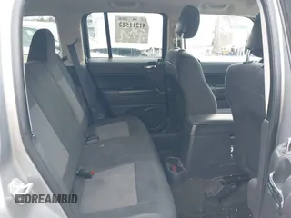2014 Jeep Patriot Latitude with VIN 1C4NJRFB6ED778433, listed as a IAAI auction lot 41211522 with 127,506 mi miles. Bid and sale history available at carsss.com. Image 8.