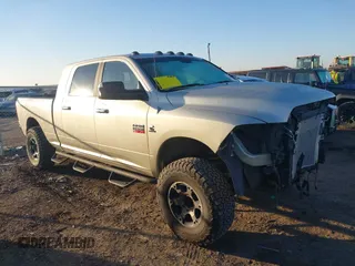 2010 Dodge 2500 SLT with VIN 3D7UT2HL0AG144119, listed as a IAAI auction lot 41161366 with 153,595 mi miles and . Bid and sale history available at DreamBid. Image 1.